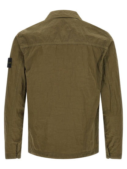 Overshirt by Stone Island for men in nylon bicolour, green & olive showcases a sleek silhouette, elegantly detailed with a sleek and for a sleek finish.