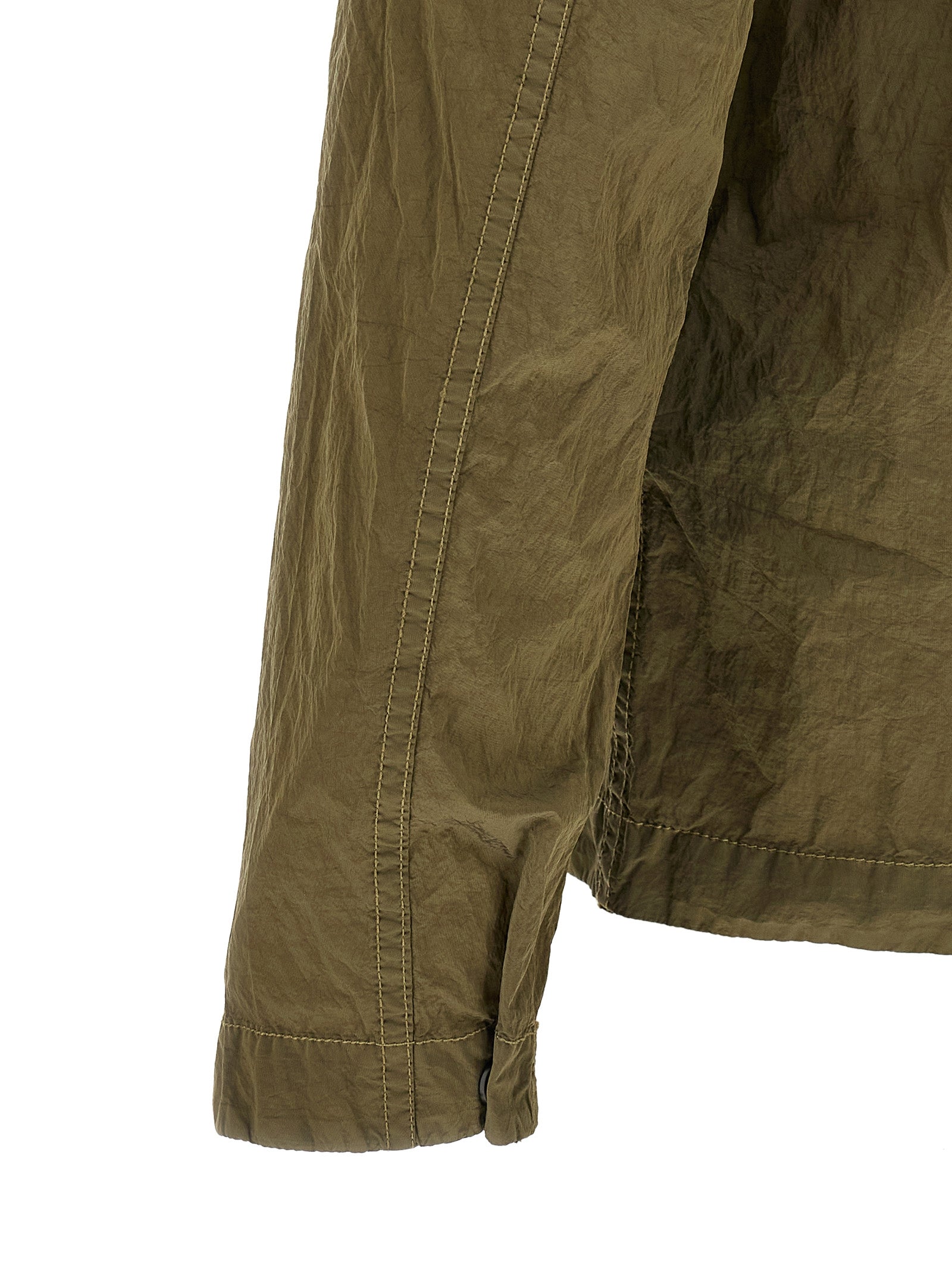 Overshirt by Stone Island for men in nylon bicolour, green & olive showcases a sharp silhouette, elegantly detailed with a sharp and sharp .