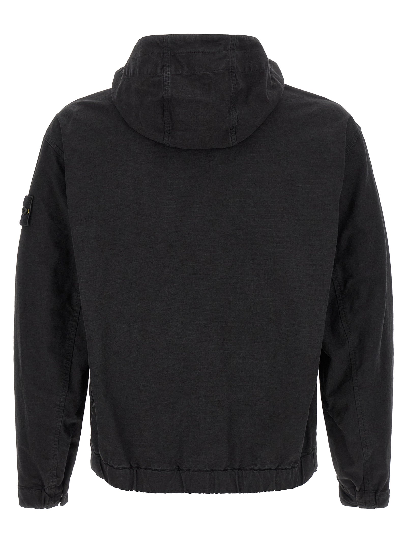 Hooded Windbreaker Jacket by Stone Island for men in cotton black presents a resilient silhouette, artfully detailed with a sophisticated hooded neckline and functional pockets, hooded & windproof for a resilient finish.