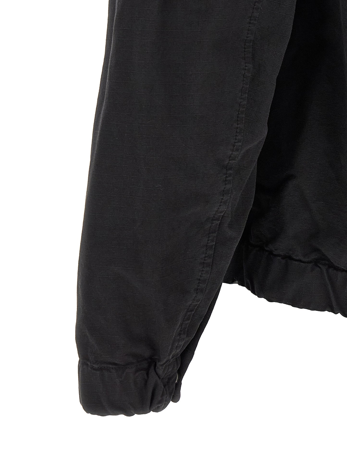 Hooded Windbreaker Jacket by Stone Island for men in cotton black features an magnificent silhouette, showcasing the sophisticated hooded neckline and functional pockets, hooded & windproof for a premium, magnificent look.