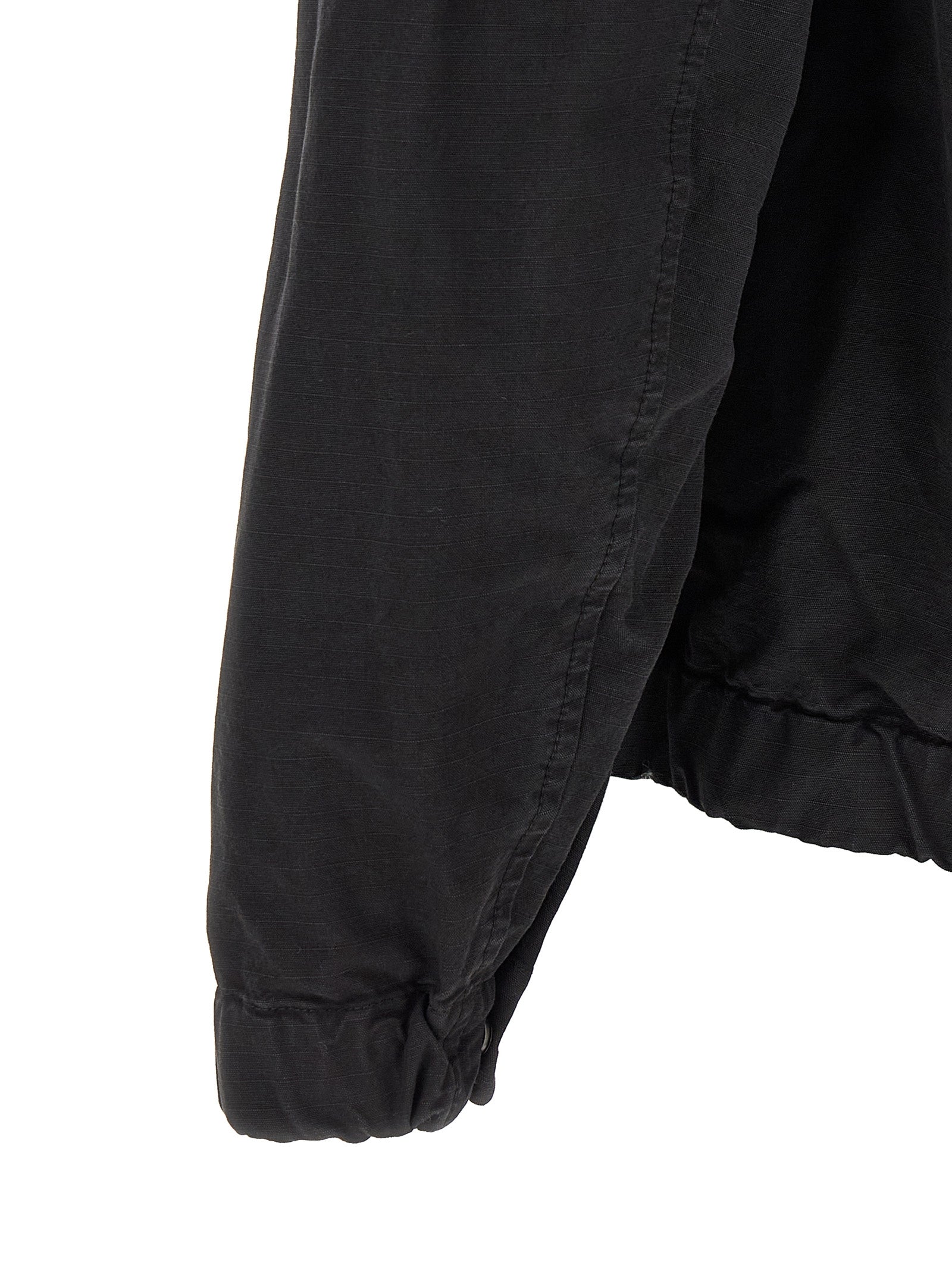 Hooded Windbreaker Jacket by Stone Island for men in cotton black features an magnificent silhouette, showcasing the sophisticated hooded neckline and functional pockets, hooded & windproof for a premium, magnificent look.