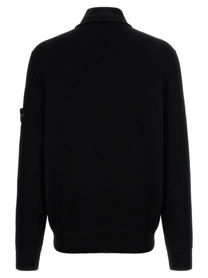 Cardigan by Stone Island for men in virgin wool black showcases a luxurious silhouette, meticulously detailed with a sophisticated high-neck neckline and for a refined finish.