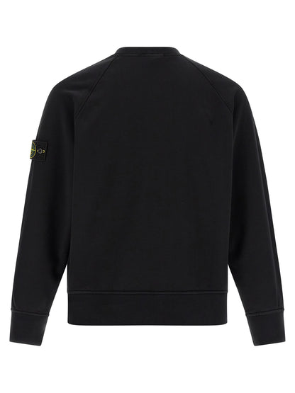 Sweatshirt by Stone Island for men in cotton black showcases a slouchy chic silhouette, artfully detailed with a slouchy chic crew neckline and for a slouchy chic finish.