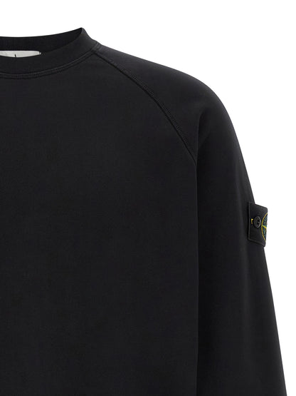 Sweatshirt by Stone Island for men in cotton black presents a smart casual silhouette, featuring a smart casual crew neckline and for a sophisticated look.