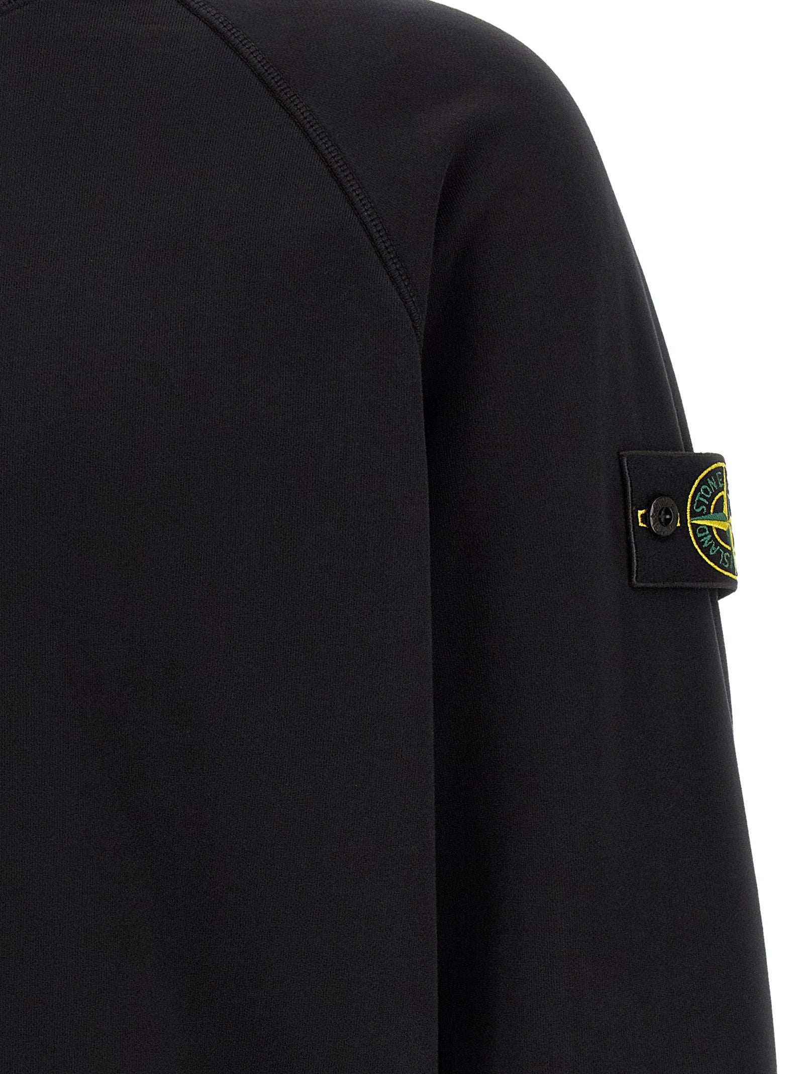 Sweatshirt by Stone Island for men in cotton black features an enviable silhouette, showcasing a premium and refined for a truly enviable finish.