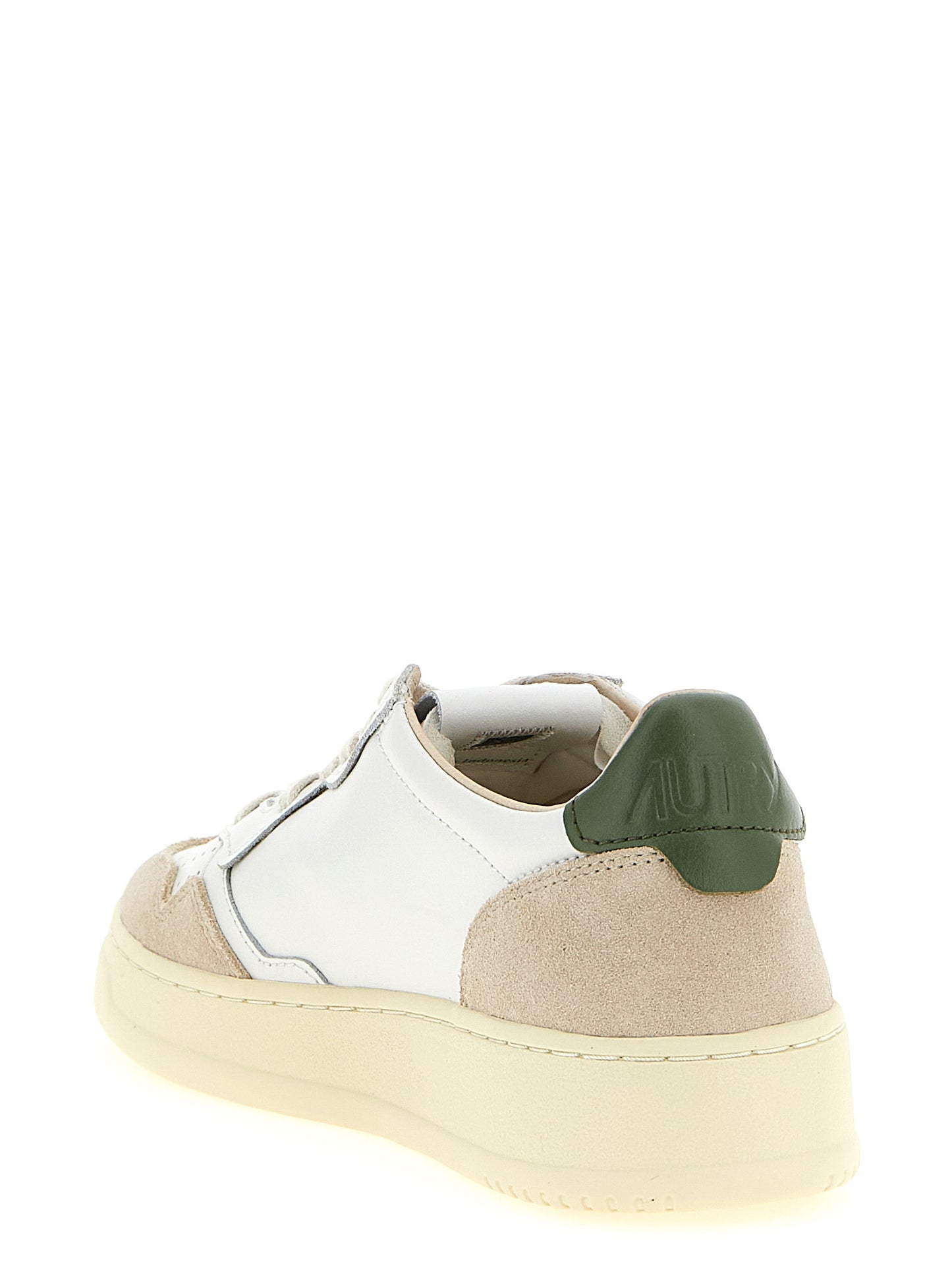 Sneakers by Autry for men in suede cowhide leather & nylon beige, green, multicolor, olive & white features an fashionable silhouette, showcasing the premium Men's Low Top Tennis Suede Cowhide Leather & Nylon Sneakers in a fashionable low-top tennis style that offers a fashionable finish for refined style.