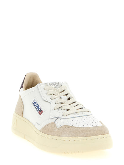 Athletic Sneakers by Autry for men in nylon & cowhide suede leather beige, multicolor, purple, white & signature features an timeless silhouette from the Men's Athletic Nylon & Cowhide Suede Leather Sneakers collection, showcasing a timeless athletic style for a timeless look.