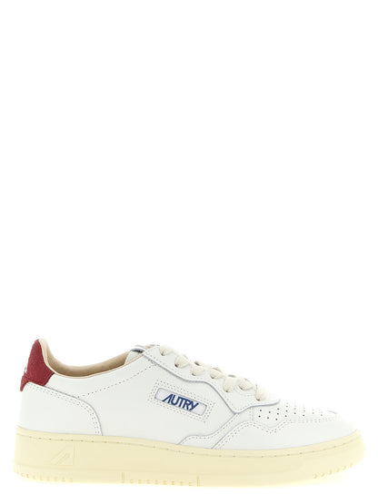 Athletic Sneakers by Autry for men in terrycloth & suede cowhide leather bordeaux, burgundy, cream, white & monogram presents a sleek silhouette, perfectly capturing the athletic style essence of Men's Athletic Terrycloth & Suede Cowhide Leather Sneakers with its sleek design and premium finish.