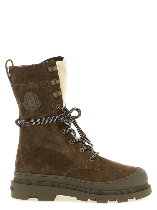 Lace-Up Winter Boots by Moncler for women in suede leather brown features an avant-garde Vera Women's Suede Leather Lace-Up Winter Boots silhouette, defined by a sophisticated and a avant-garde .