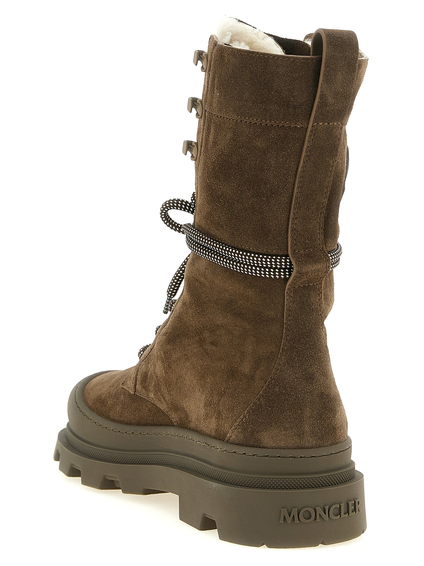 Lace-Up Winter Boots by Moncler for women in suede leather brown features an effortless chic silhouette from the Vera Women's Suede Leather Lace-Up Winter Boots collection, showcasing a effortless chic and refined for an effortless chic look.