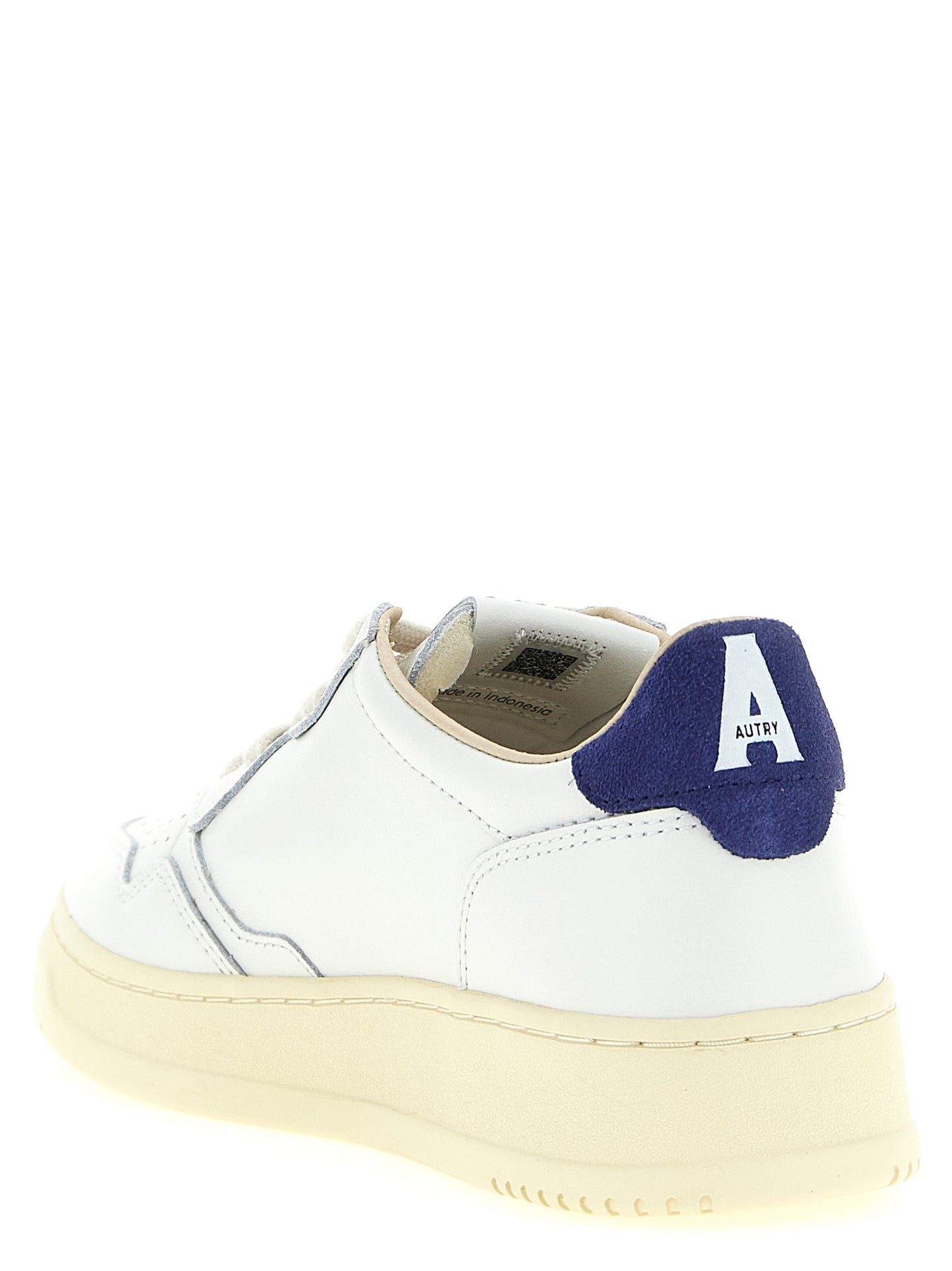 Athletic Sneakers by Autry for men in bos taurus suede cowhide leather cream, dark-blue & white features an exquisite silhouette, showcasing the premium low-top style of the Men's Low Top Bos Taurus Suede Cowhide Leather Athletic Sneakers with an exquisite finish.