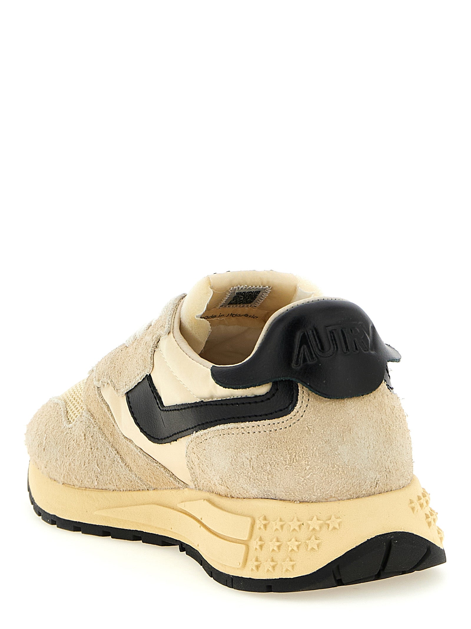 Athletic Sneakers by Autry for men in cotton nylon & suede leather black & patterned presents a sleek silhouette, perfectly capturing the athletic style essence of Ecru Star Men's Athletic Cotton Nylon & Suede Leather Sneakers with its sleek design and premium finish.