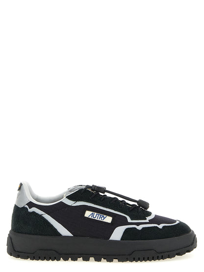 Athletic Sneakers by Autry for men in tu nylon suede leather black & silver presents a sleek silhouette, perfectly capturing the low-top style essence of Men's Low Top TU Nylon Suede Leather Athletic Sneakers with its sleek design and premium finish.