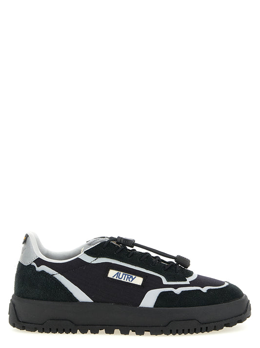 Athletic Sneakers by Autry for men in tu nylon suede leather black & silver presents a sleek silhouette, perfectly capturing the low-top style essence of Men's Low Top TU Nylon Suede Leather Athletic Sneakers with its sleek design and premium finish.
