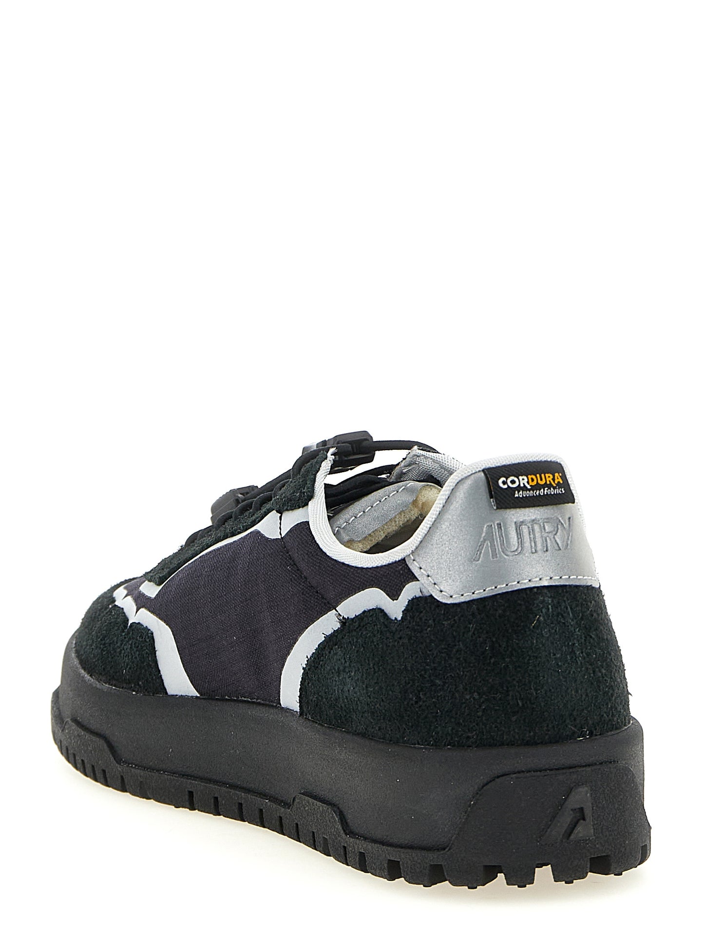 Athletic Sneakers by Autry for men in tu nylon suede leather black & silver showcases a architectural silhouette, artfully capturing the essence of the Men's Low Top TU Nylon Suede Leather Athletic Sneakers with its signature architectural low-top style construction.