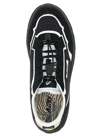 Athletic Sneakers by Autry for men in tu nylon suede leather black & silver showcases an impeccable silhouette, defined by an impeccable low-top style design that perfectly captures the essence of the Men's Low Top TU Nylon Suede Leather Athletic Sneakers.