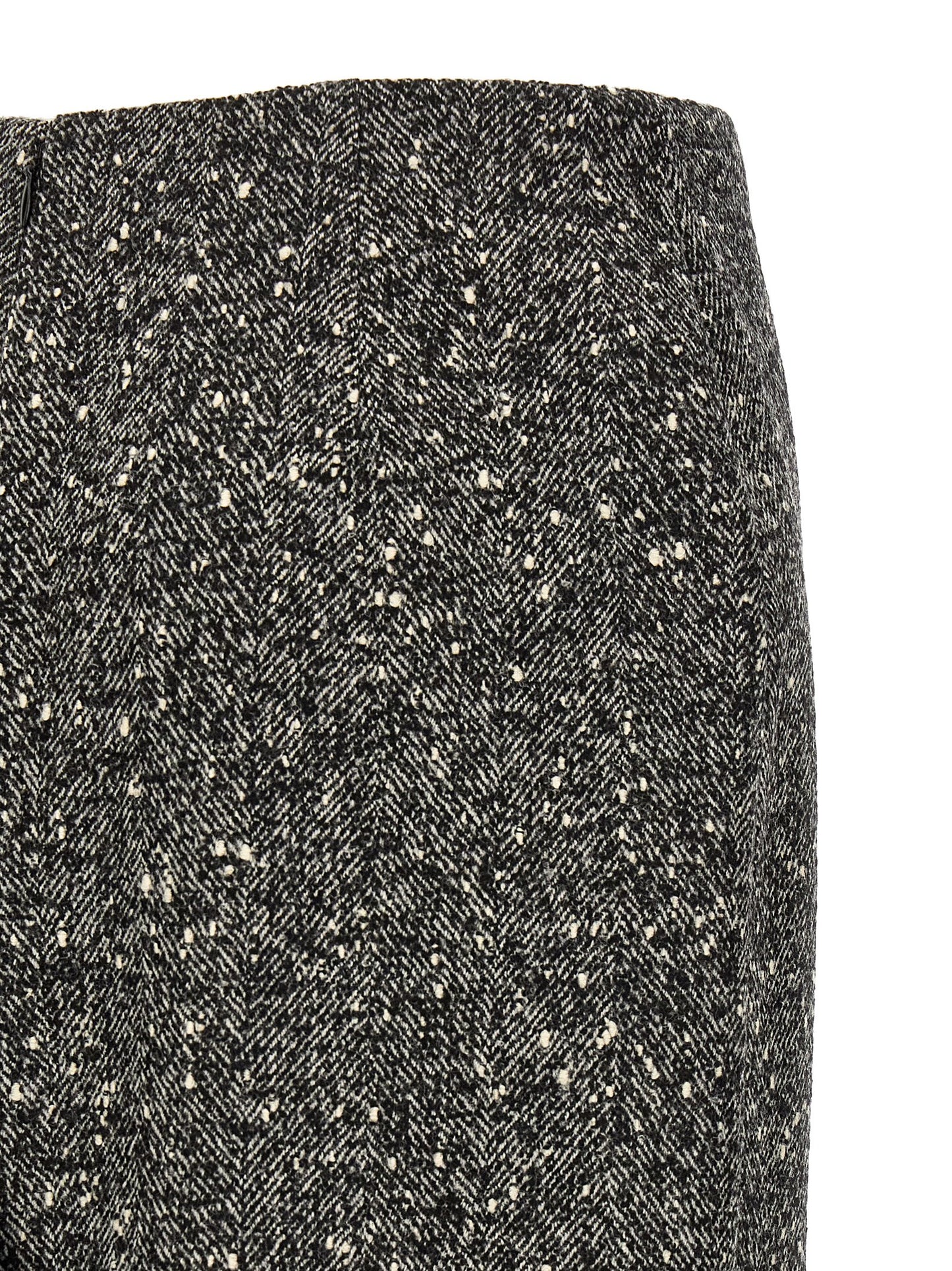 Skirt by Valentino Garavani for women in polyamide & virgin wool bicolour, black, white & chevron features a sublime silhouette, showcasing the sublime design of the Women's Pencil Asymmetrical High Rise Polyamide & Virgin Wool Skirt in a sophisticated midi.