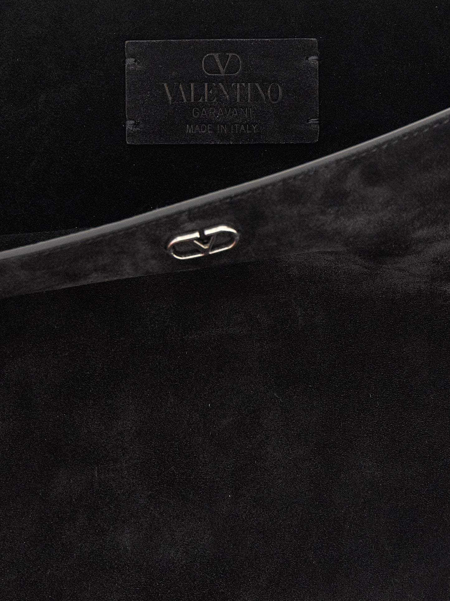 Shoulder Bag by Valentino Garavani for men in suede calfskin leather black, silver & signature features a enviable silhouette, showcasing a secure , ample , and enviable shoulder-strap & adjustable-strap for a enviable finish.