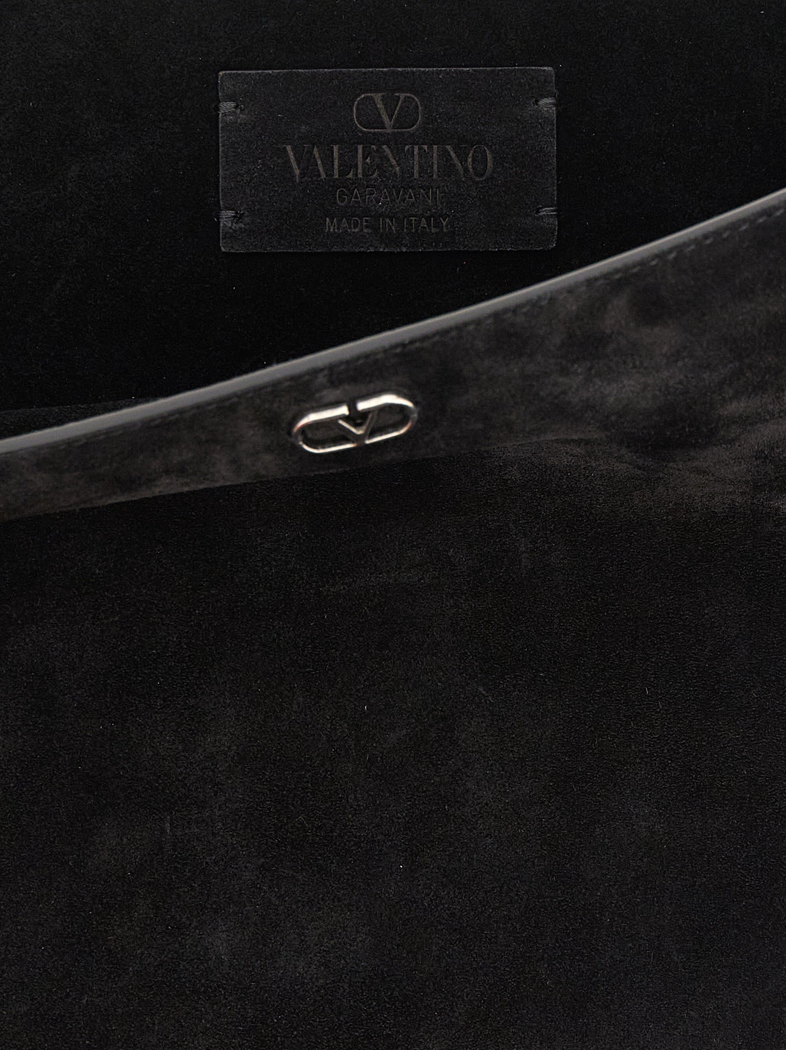 Shoulder Bag by Valentino Garavani for men in suede calfskin leather black, silver & signature features a enviable silhouette, showcasing a secure , ample , and enviable shoulder-strap & adjustable-strap for a enviable finish.