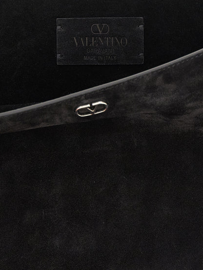 Shoulder Bag by Valentino Garavani for men in suede calfskin leather black, silver & signature features a enviable silhouette, showcasing a secure , ample , and enviable shoulder-strap & adjustable-strap for a enviable finish.
