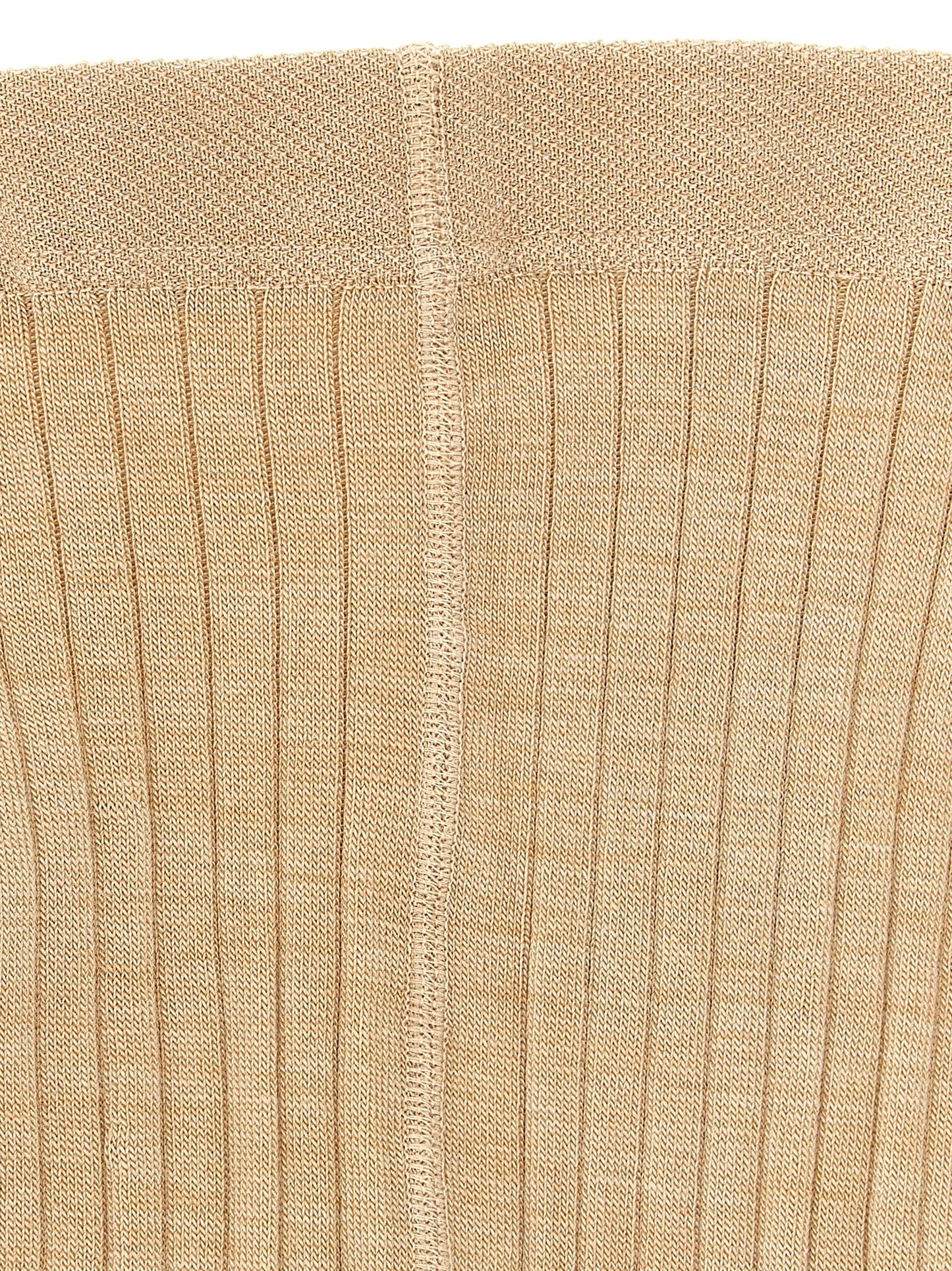 Hosiery by Jil Sander for women in polyamide wool beige presents a cute silhouette, seamless in its construction and perfectly capturing the refined essence of Women's Polyamide Wool Hosiery with a cute finish.