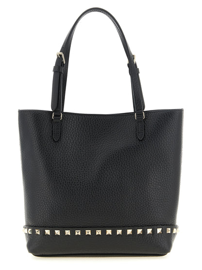 Small Shoulder Tote Bag by Valentino Garavani for women in calfskin leather black presents a versatile silhouette, showcasing a secure zipper and versatile with versatile shoulder-strap, handle, adjustable-strap & detachable-strap for a sophisticated look.