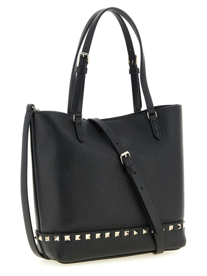Small Shoulder Tote Bag by Valentino Garavani for women in calfskin leather black features a effortless sophistication silhouette, secured by a zipper with ample and versatile shoulder-strap, handle, adjustable-strap & detachable-strap for a effortless sophistication finish.