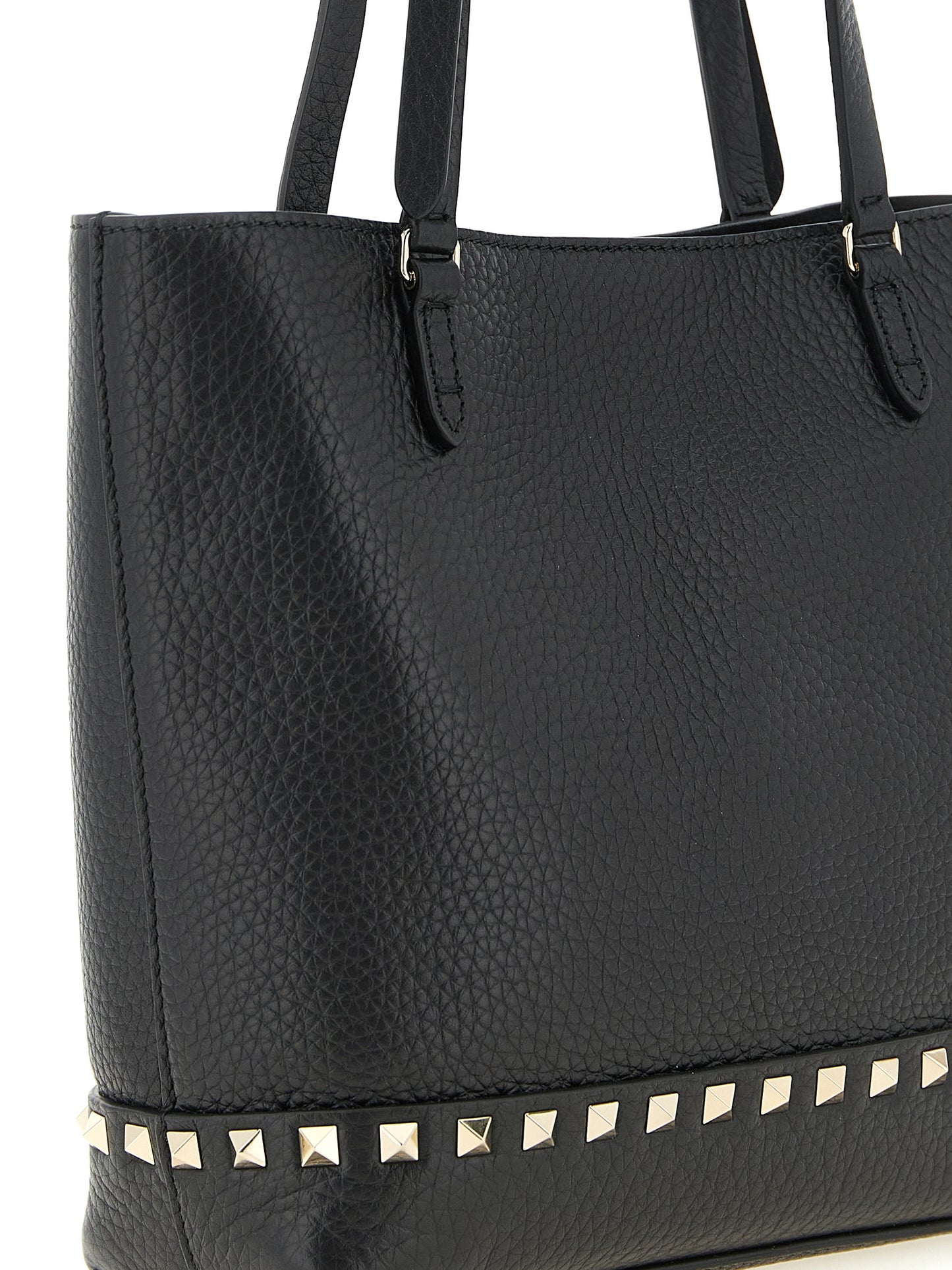 Small Shoulder Tote Bag by Valentino Garavani for women in calfskin leather black features a effortless sophistication silhouette, secured by a zipper with ample and versatile shoulder-strap, handle, adjustable-strap & detachable-strap for a effortless sophistication finish.
