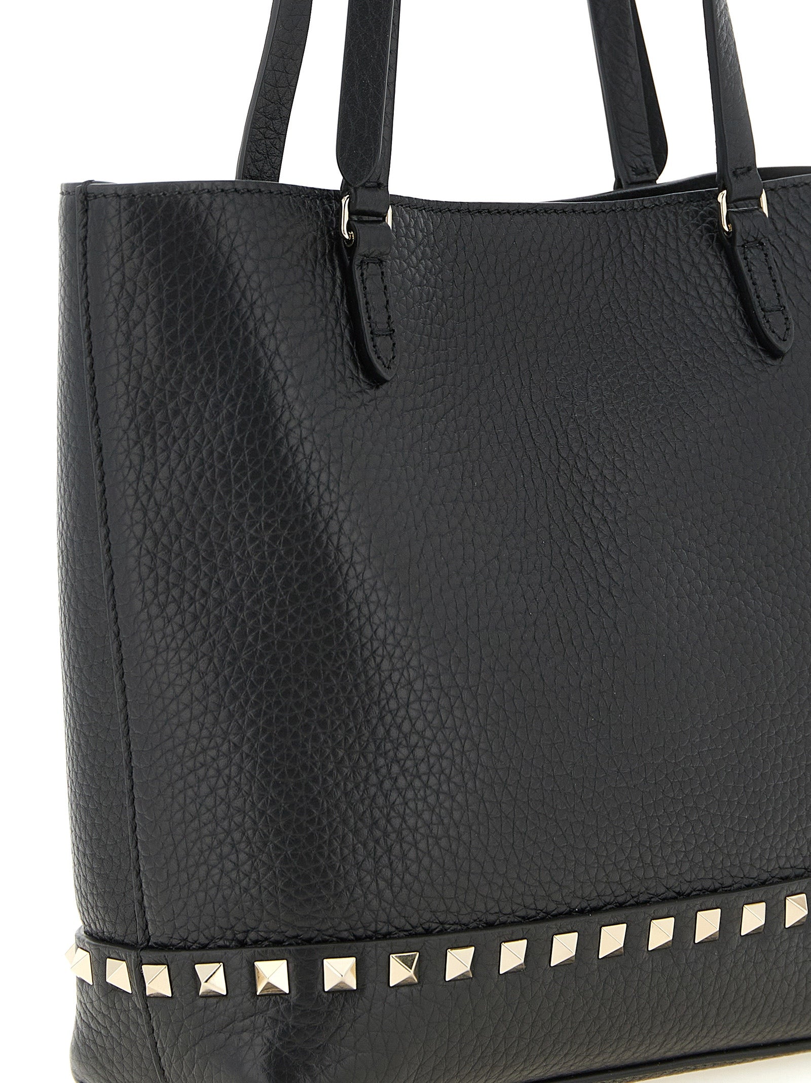 Small Shoulder Tote Bag by Valentino Garavani for women in calfskin leather black features a effortless sophistication silhouette, secured by a zipper with ample and versatile shoulder-strap, handle, adjustable-strap & detachable-strap for a effortless sophistication finish.