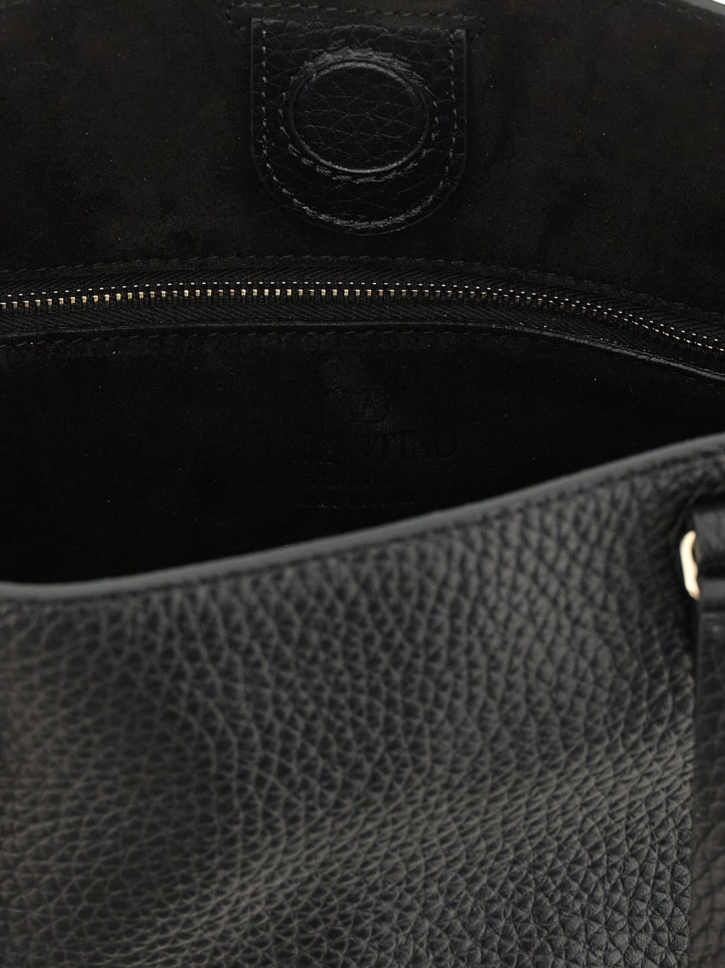 Small Shoulder Tote Bag by Valentino Garavani for women in calfskin leather black presents a versatile silhouette, showcasing a secure zipper and versatile with versatile shoulder-strap, handle, adjustable-strap & detachable-strap for a sophisticated look.