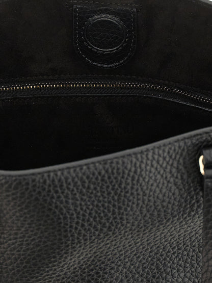 Small Shoulder Tote Bag by Valentino Garavani for women in calfskin leather black presents a versatile silhouette, showcasing a secure zipper and versatile with versatile shoulder-strap, handle, adjustable-strap & detachable-strap for a sophisticated look.