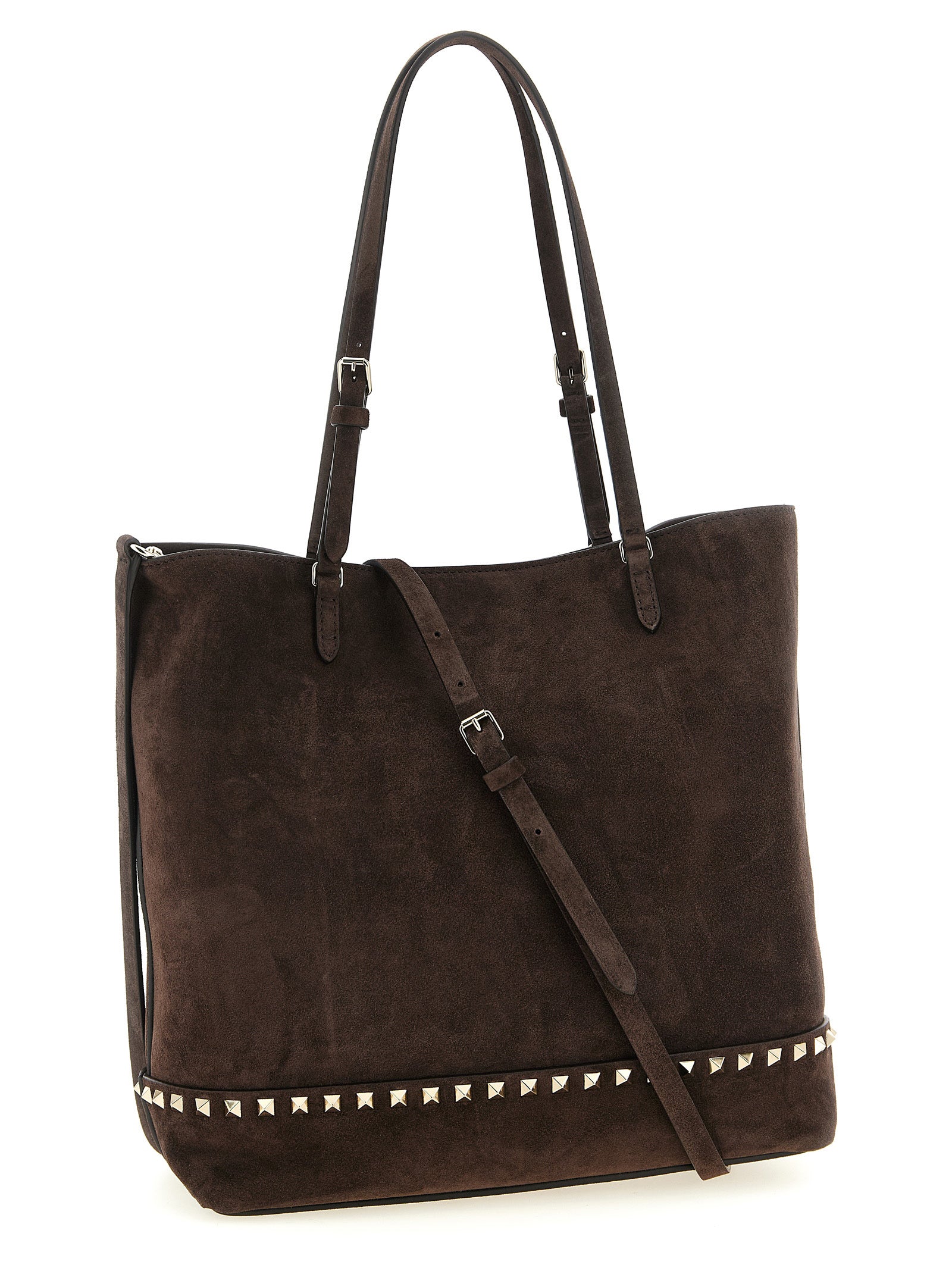 Medium Shoulder Tote Bag by Valentino Garavani for women in suede calfskin leather brown features a distinguished silhouette, showcasing a secure zipper, magnetic & buckle and distinguished with versatile shoulder-strap, adjustable-strap & handle for a distinguished finish.