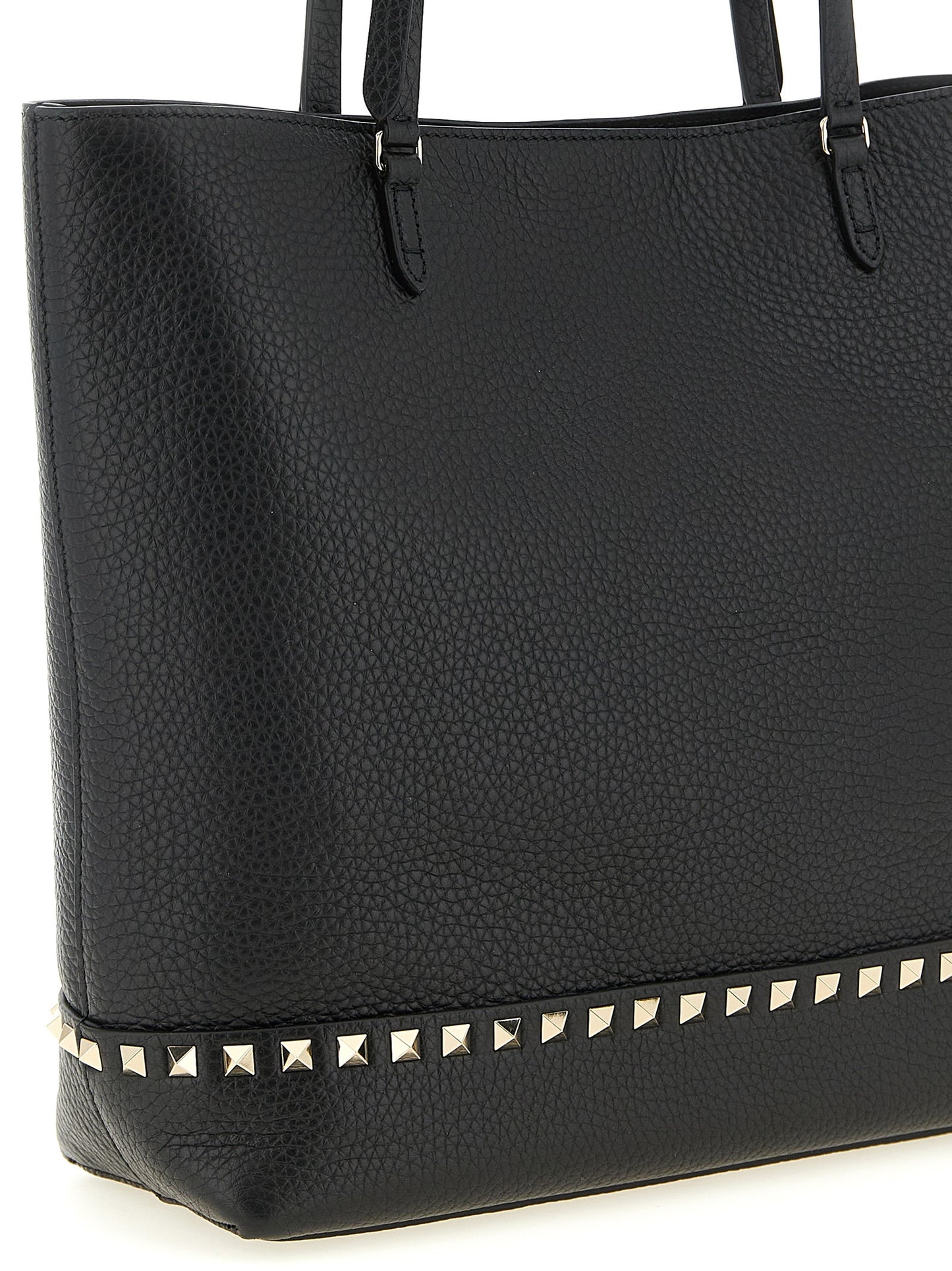 Medium Shoulder Tote Bag by Valentino Garavani for women in suede calfskin leather black & print features a enviable silhouette, showcasing a secure zipper & magnetic, ample , and enviable shoulder-strap, handle & adjustable-strap for a enviable finish.