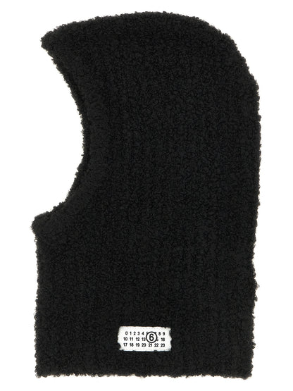 Balaclava by MM6 Maison Margiela for women in marabou wool black & signature features a riviera-ready silhouette, artfully capturing the essence of the riviera-ready Marabou Wool Balaclava design for a sophisticated look.