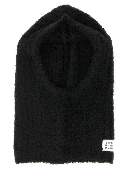 Balaclava by MM6 Maison Margiela for women in marabou wool black & signature features a beach chic design, perfectly capturing the essence of the Marabou Wool Balaclava collection.