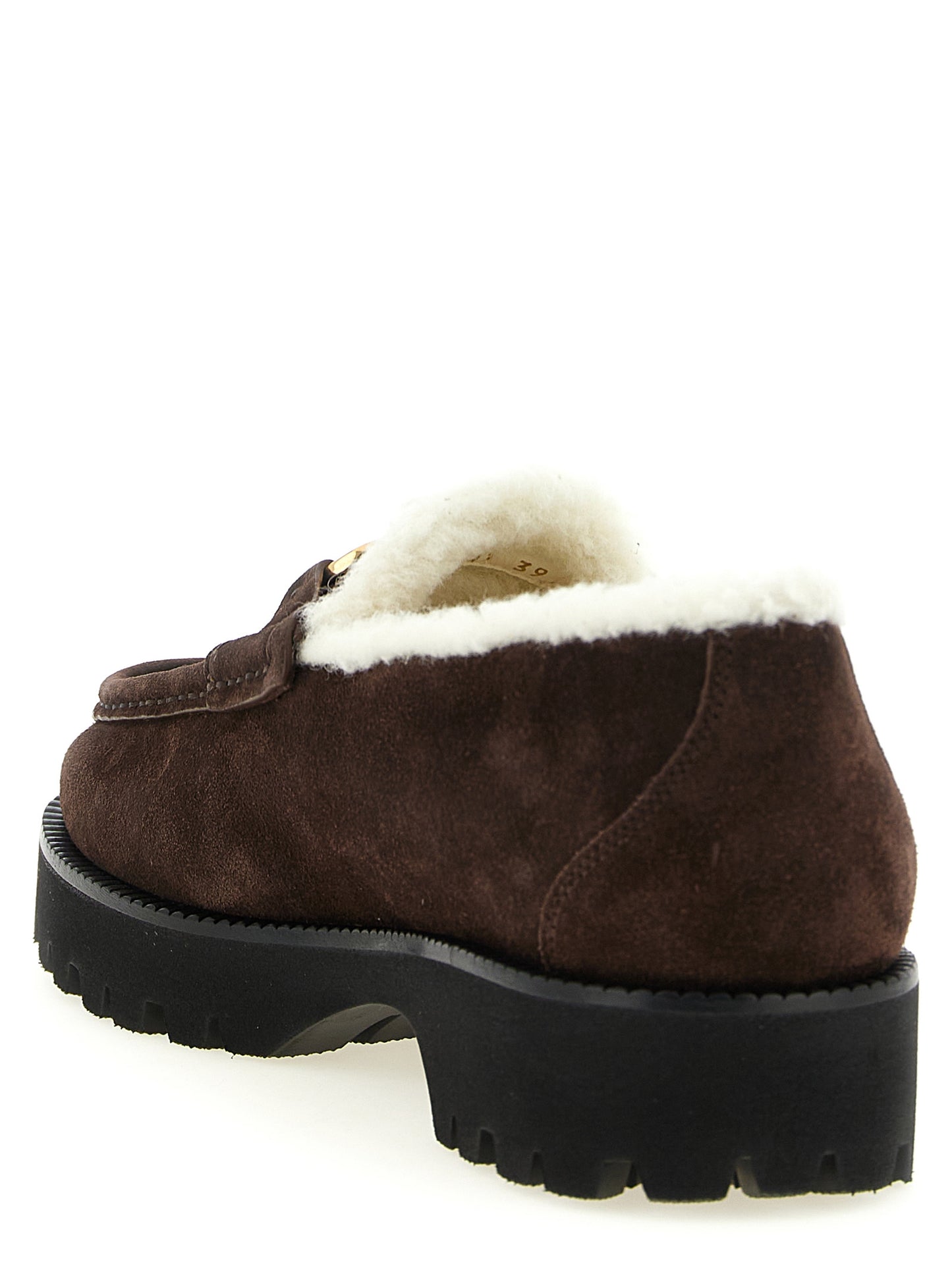 This Flat Loafer Slip-On Shoes by Valentino Garavani for women in suede calfskin leather brown, gold & signature features an exquisite silhouette from the V Logo Women's Suede Calfskin Leather Flat Loafer Slip-On Shoes collection, defined by a sophisticated flat and elegant .