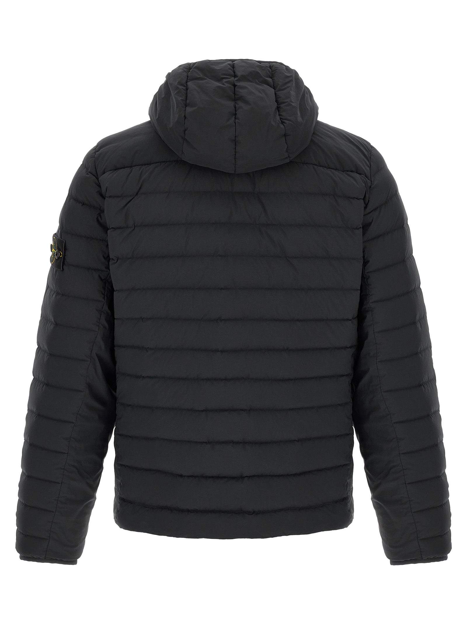 Hooded Puffer Jacket by Stone Island for men in stretch polyamide black presents a effortlessly chic silhouette, showcasing a sophisticated hooded high-neck neckline and premium lightweight, pockets, hooded, insulated & windproof for a truly effortlessly chic finish.