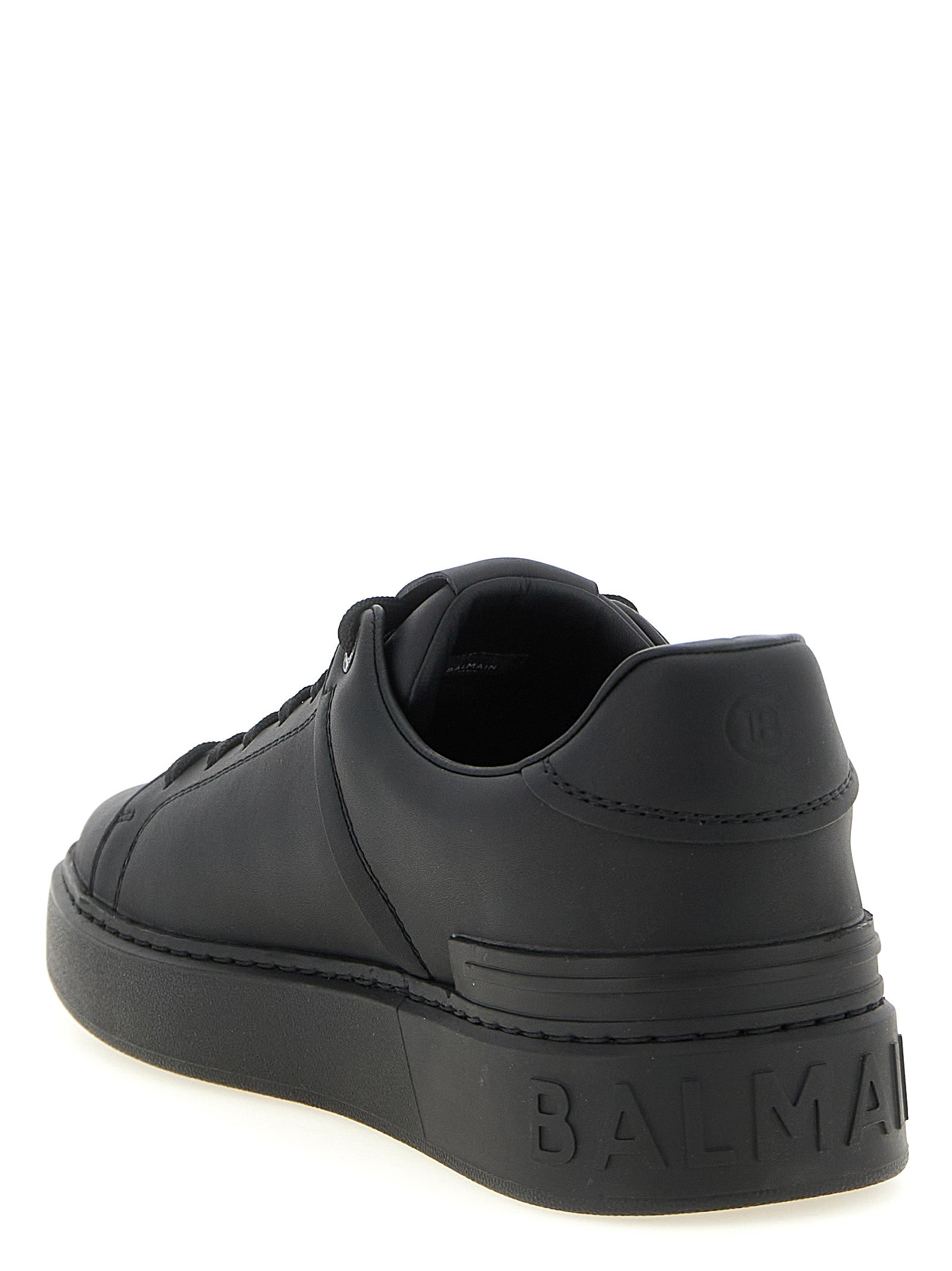 Sneakers by Balmain for men in bos taurus calfskin leather black, signature & monogram features an fashionable silhouette, showcasing the premium Men's Low Top Bos Taurus Calfskin Leather Sneakers in a fashionable low-top style that offers a fashionable finish for refined style.