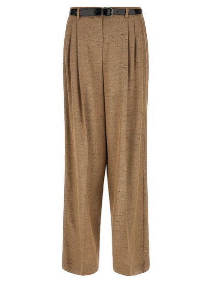 Trousers by Dolce & Gabbana for women in linen polyamide & viscose tweed beige presents a perennial silhouette, meticulously tailored with a wide cut, long finish, and an elegant high rise.