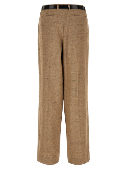 Trousers by Dolce & Gabbana for women in linen polyamide & viscose tweed beige presents a smart silhouette, meticulously detailed with a smart wide, a smart long, and a smart high rise.