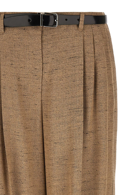 Trousers by Dolce & Gabbana for women in linen polyamide & viscose tweed beige features an sartorial silhouette, showcasing a precise wide and long with a sartorial high rise for a refined look.