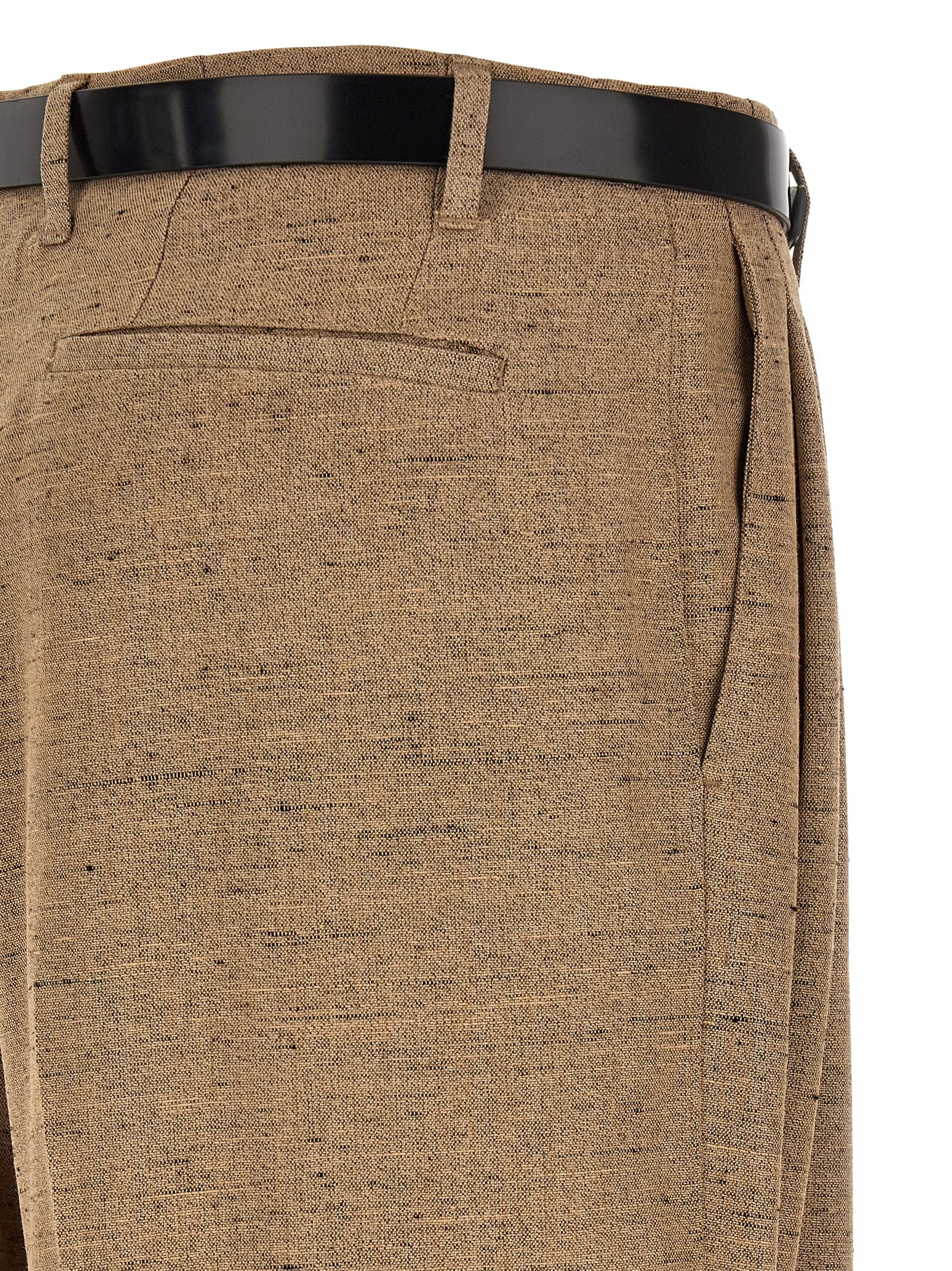 Trousers by Dolce & Gabbana for women in linen polyamide & viscose tweed beige features an on trend silhouette, showcasing a sophisticated wide with a long and high rise for an on trend finish.