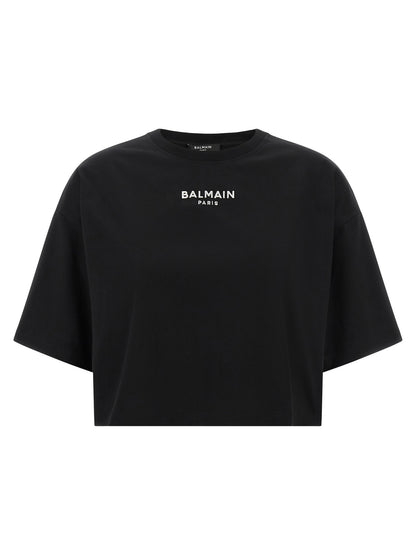 T-Shirt by Balmain for women in cotton black showcases a dramatic silhouette, elegantly detailed with a dramatic and short-sleeve for a truly dramatic finish.