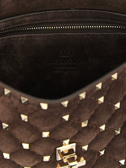 2-in-1 Shoulder & Crossbody Handbag by Valentino Garavani for women in suede calfskin leather brown showcases a versatile sophistication silhouette, featuring a secure zipper, versatile sophistication , and versatile crossbody-strap, shoulder-strap & handle for a versatile sophistication finish.