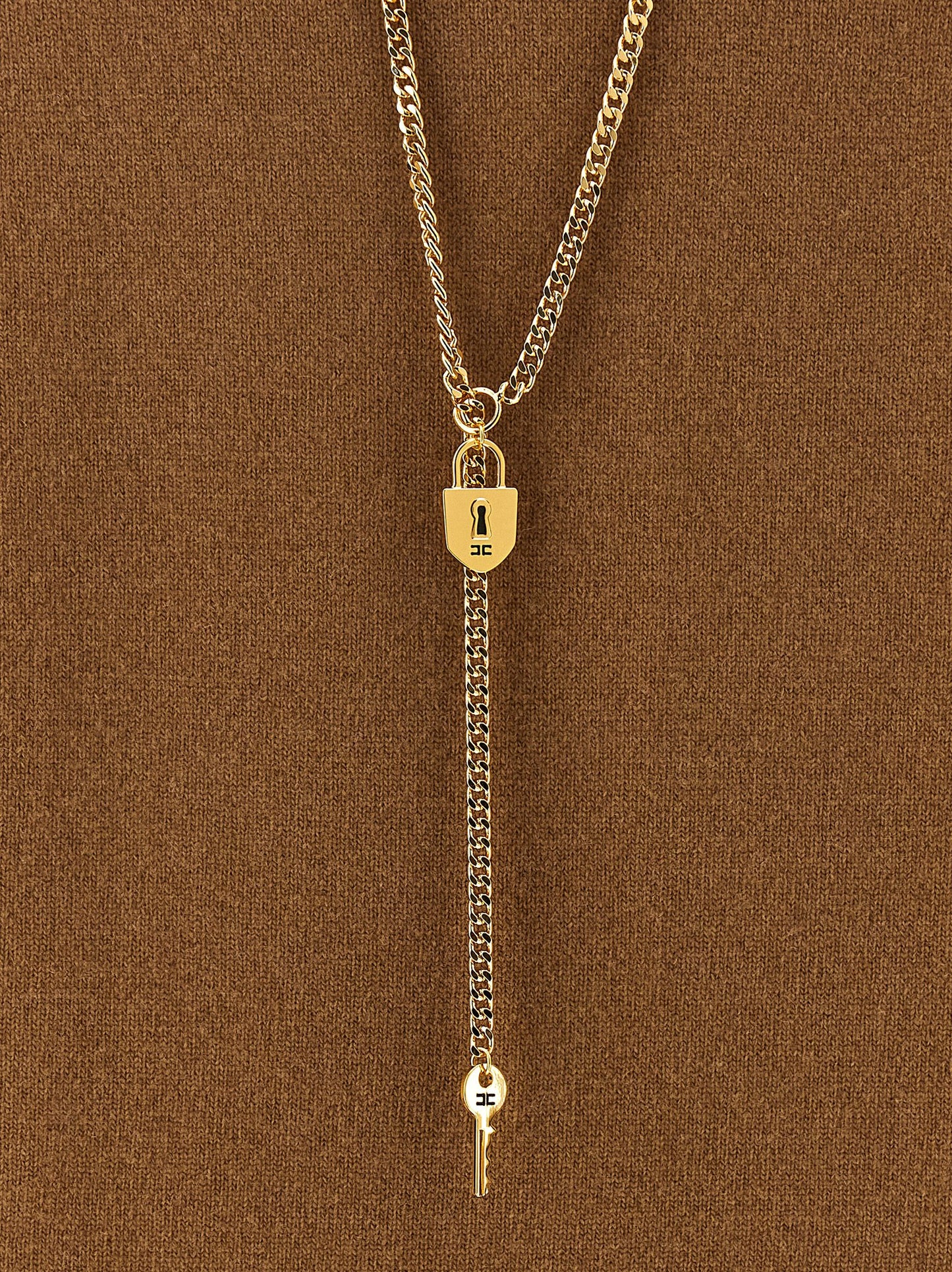 Dress by Elisabetta Franchi for women in polyamide & cashmere brown, gold & monogram features an eye catching silhouette with a sophisticated , elegant , and a refined short for a eye catching aesthetic.