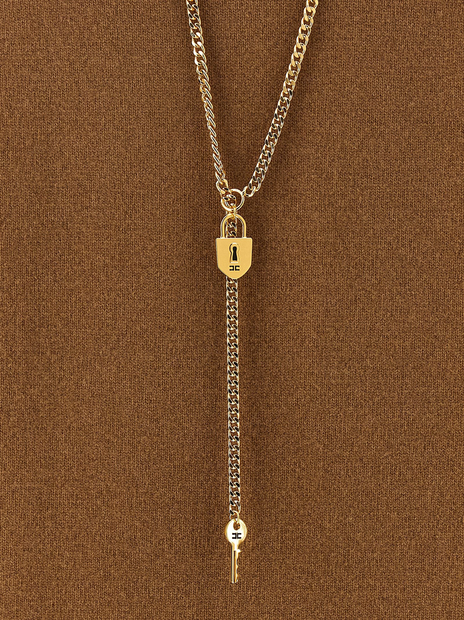 Dress by Elisabetta Franchi for women in polyamide & cashmere brown, gold & monogram features an eye catching silhouette with a sophisticated , elegant , and a refined short for a eye catching aesthetic.