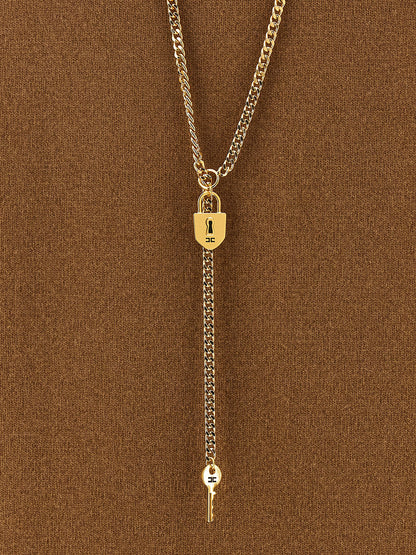 Dress by Elisabetta Franchi for women in polyamide & cashmere brown, gold & monogram features an eye catching silhouette with a sophisticated , elegant , and a refined short for a eye catching aesthetic.