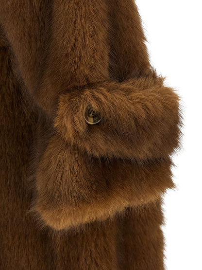 Trench Coat by B&B COUTURE for women in polyester brown presents an sculptural silhouette, artfully detailed with a sculptural and functional for a truly sculptural finish.