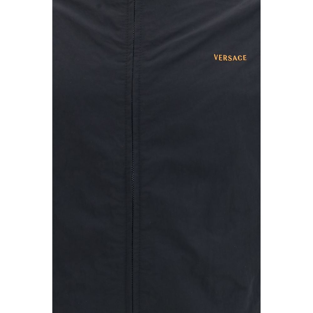Bomber Jacket by Versace for men in nylon black & jacquard features an contemporary silhouette, showcasing a sophisticated and contemporary lightweight & pockets for a truly refined look.