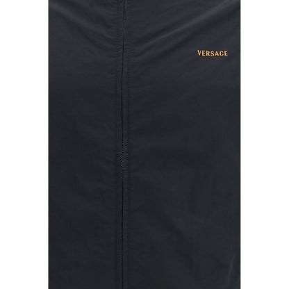 Bomber Jacket by Versace for men in nylon black & jacquard features an contemporary silhouette, showcasing a sophisticated and contemporary lightweight & pockets for a truly refined look.
